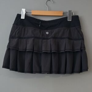 Size 6. Lululemon Run: Pace Setter Skirt/ Skort in Black.